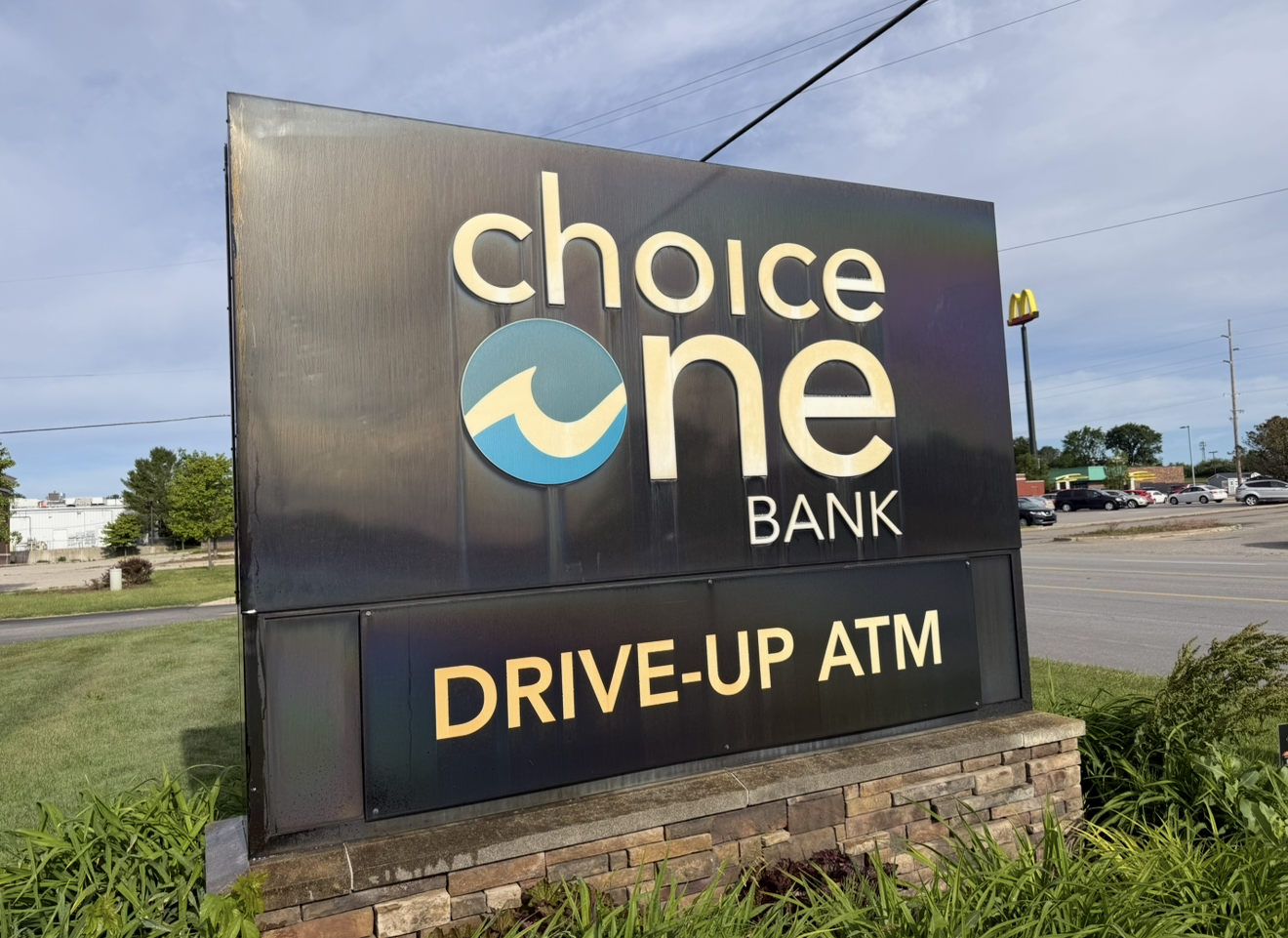 Choice One Bank sign with “Drive-Up ATM” text on a roadside monument sign