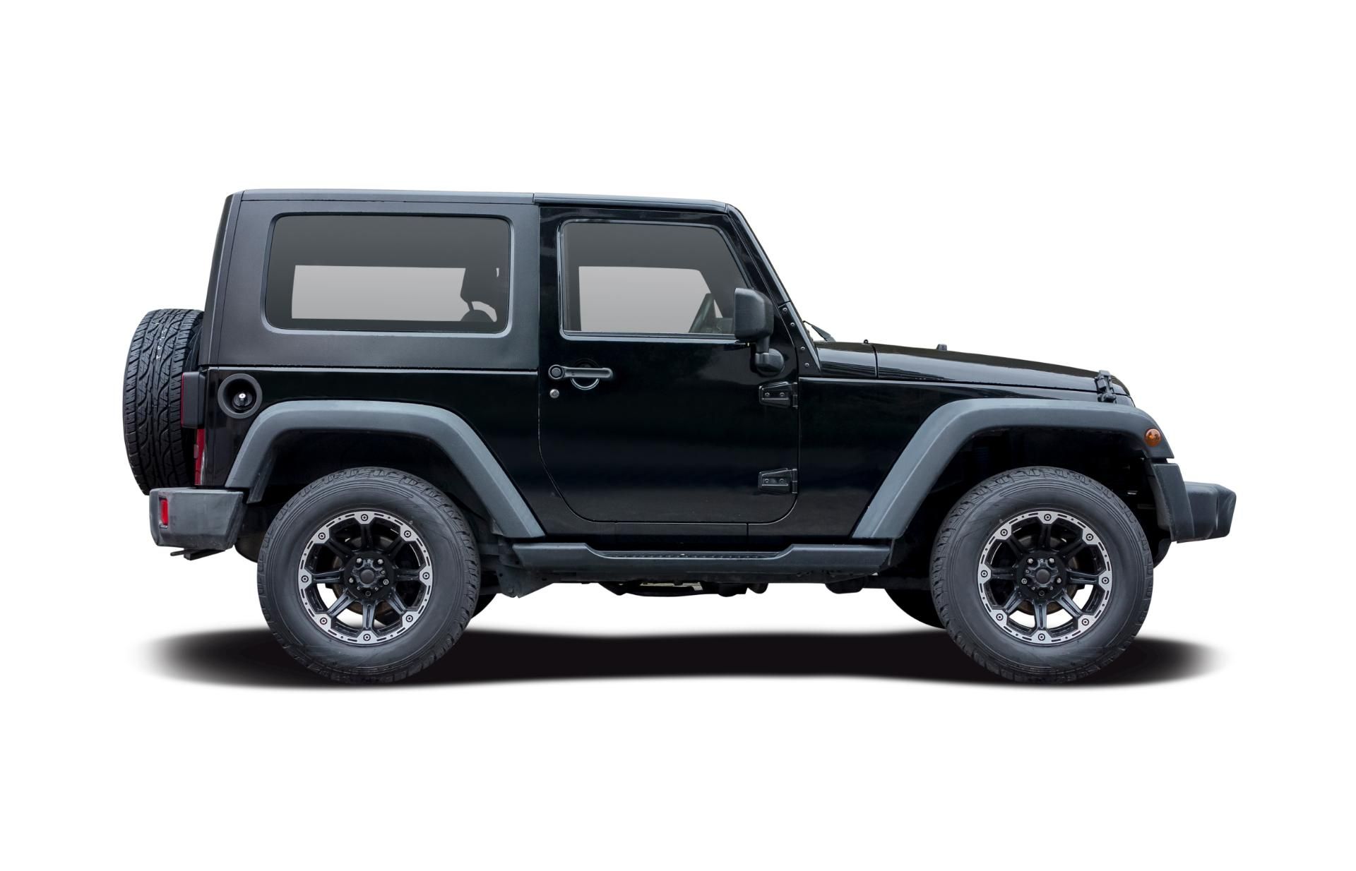 Black two-door Jeep Wrangler SUV in side profile on a white background