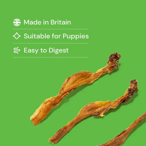 Three dried brown root or herb pieces on a white background