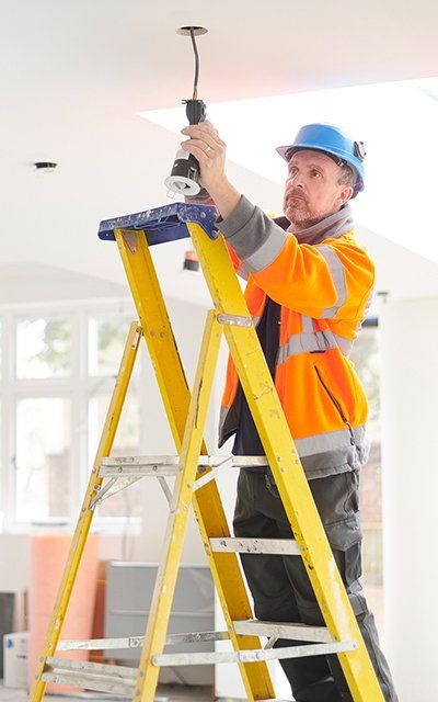 Electrician Fixing Light Connection | Finksburg, MD | Handyman On Call LLC Electrician Fixing Light Connection | Finksburg, MD | Handyman On Call LLC