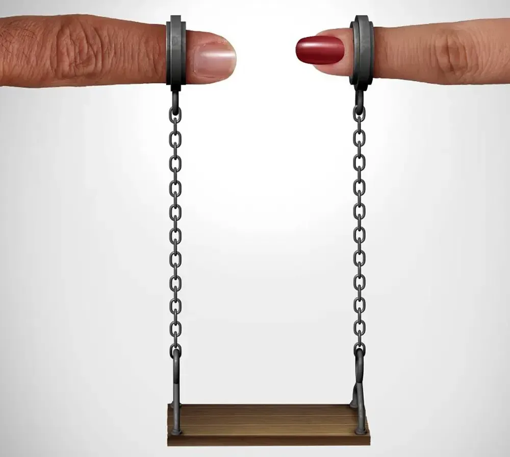 fingers holding a swing related to divorce mediation and child custody in new jersey