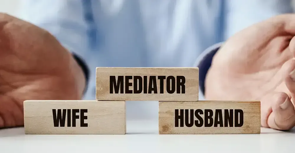 photo illustration showing mediator block as it relates to divorce in new jersey