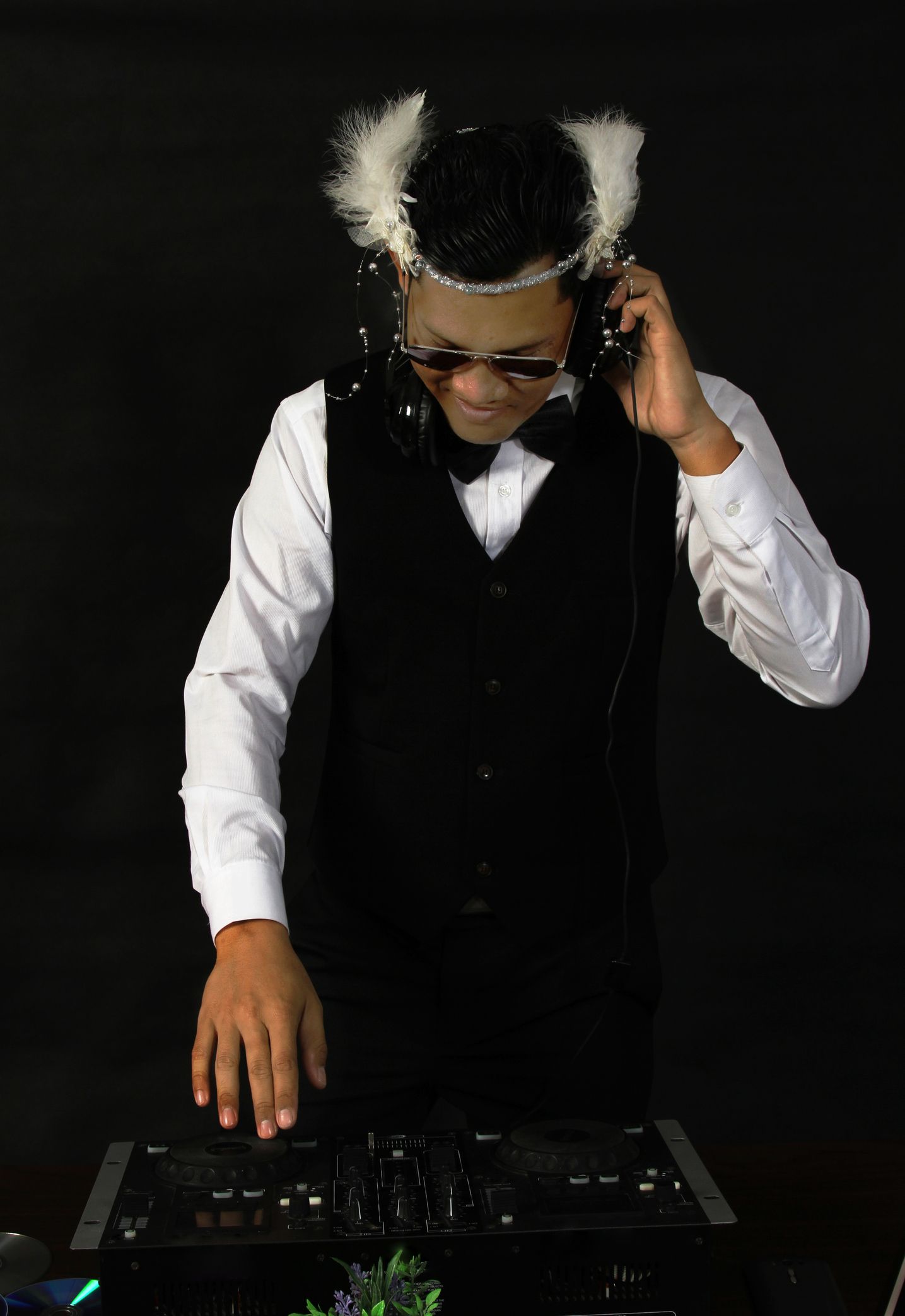 Entertainment unlimited wedding dj at his turntables