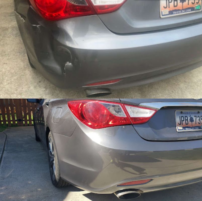 A gray car with a license plate that says jpb t33