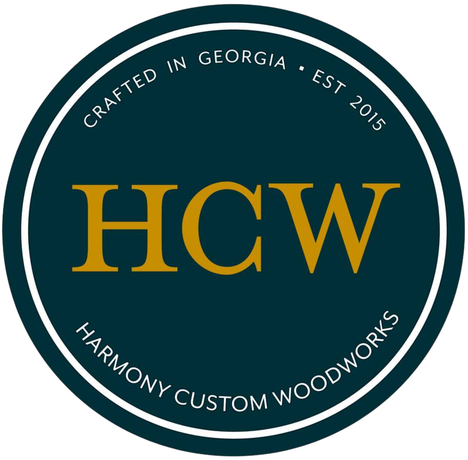 HGW logo in gold on dark teal circle, with “Harmony Custom Woodworks” and “Crafted in Georgia • Est. 2015”