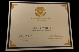 Certified Wedding Planner certificate for Terry White, in cream and gold with decorative corners.