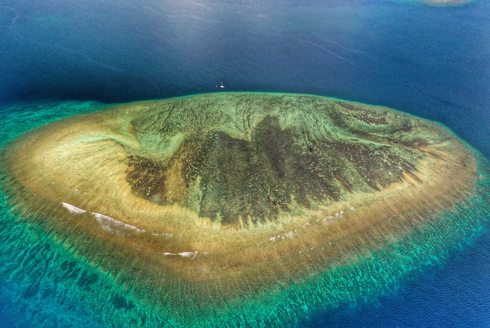 A small island in the middle of the ocean