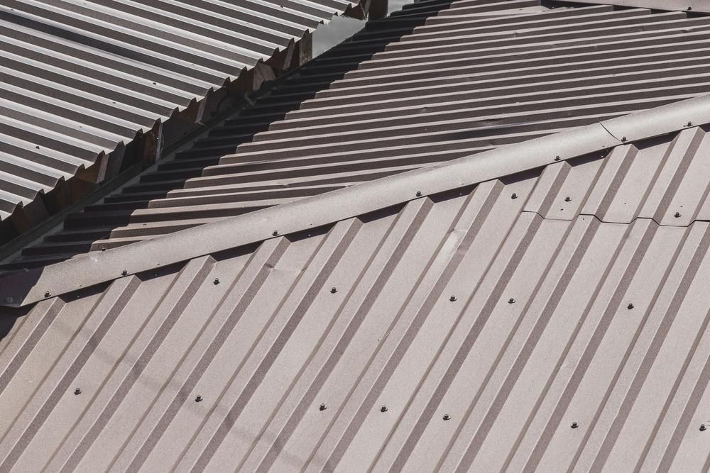 A Close up Of a Metal Roof on A Building — Apex Roofing Group in Brunswick Heads, NSW