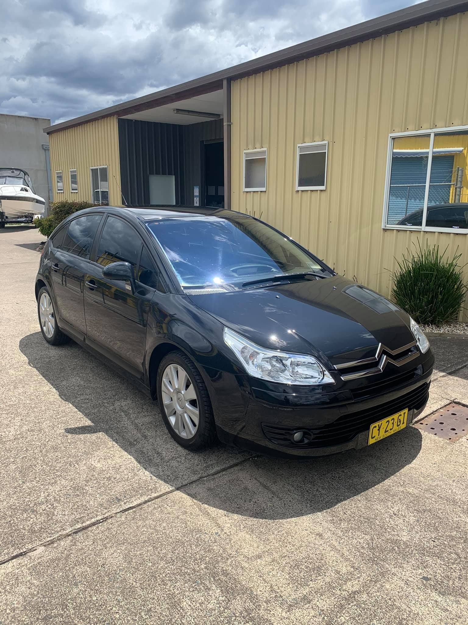 Black Citroen C4 Parked in Front of a Tan Building on a Sunny Day  — Adettra in Tuncurry, NSW