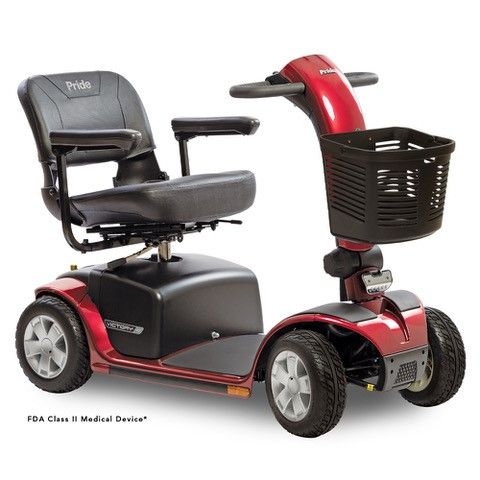 A red mobility scooter with a basket attached to it.