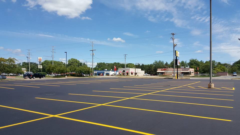 Sealcoat Parking Lot With Few Stores - Clio, MI - Chippewa Asphalt Paving Sealcoat Parking Lot With Few Stores - Clio, MI - Chippewa Asphalt Paving