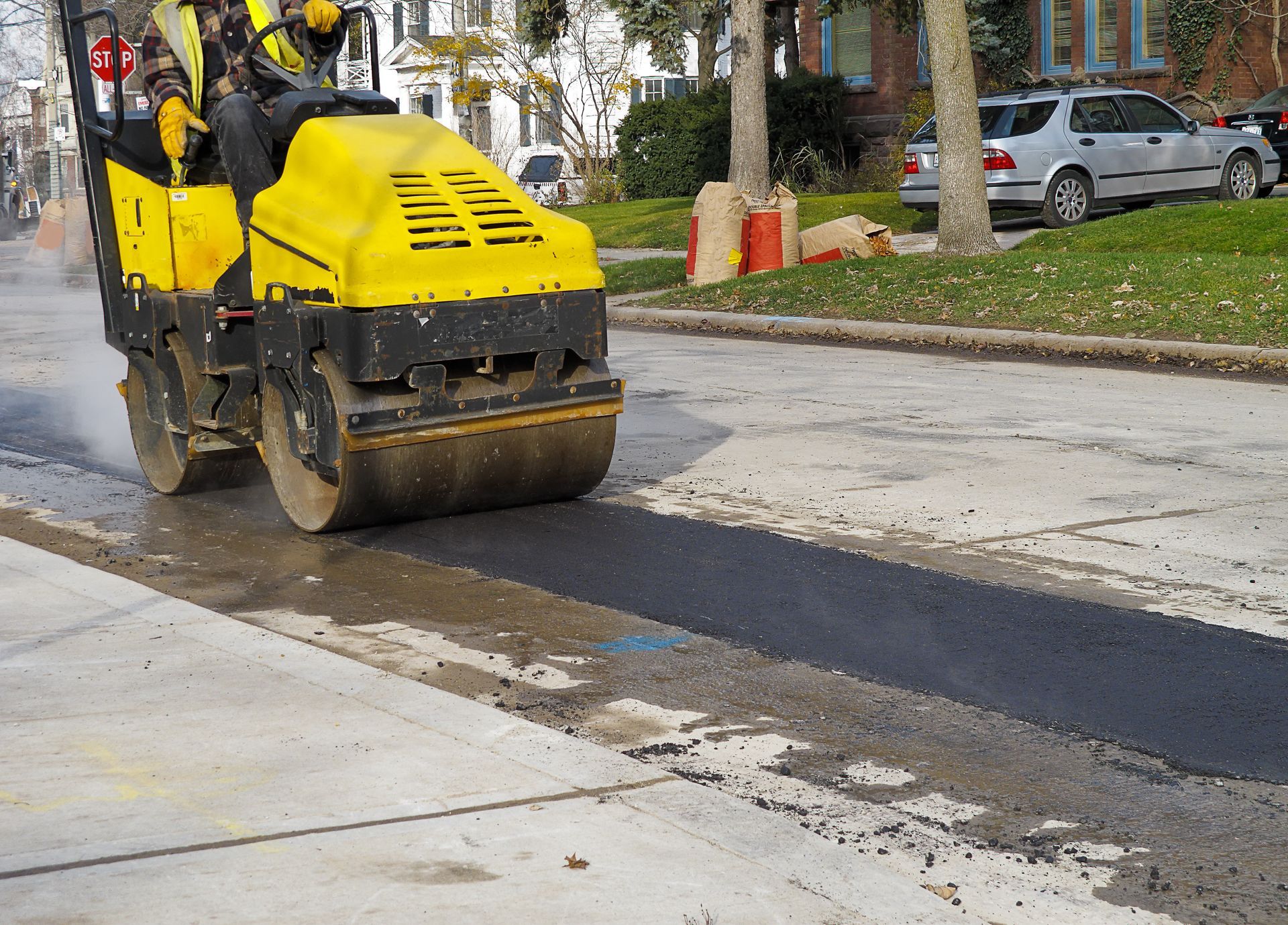Asphalt roller resurfacing road