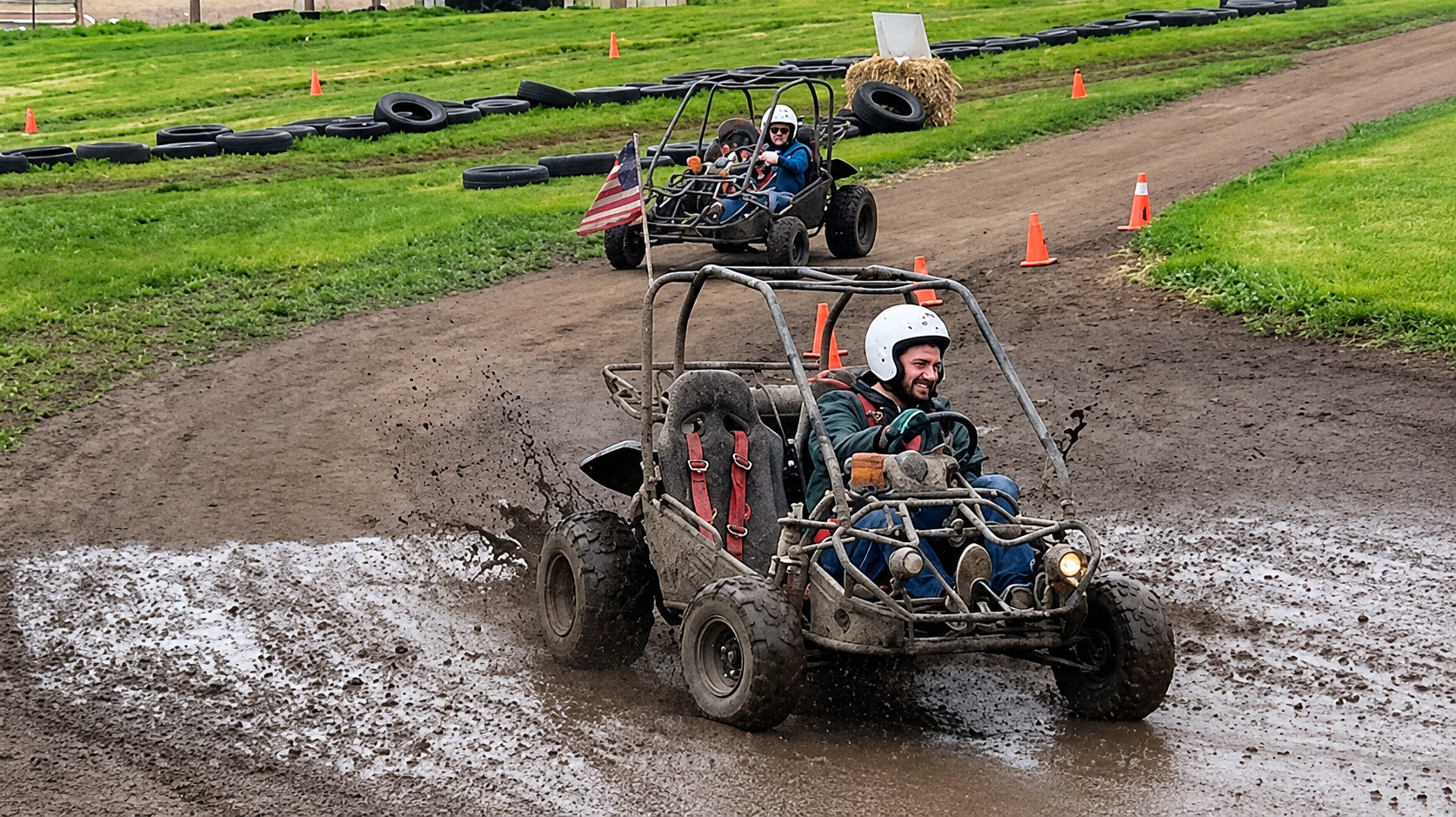 Go-kart drifting on a dirt track, kicking up dust, with spectators watching in the background