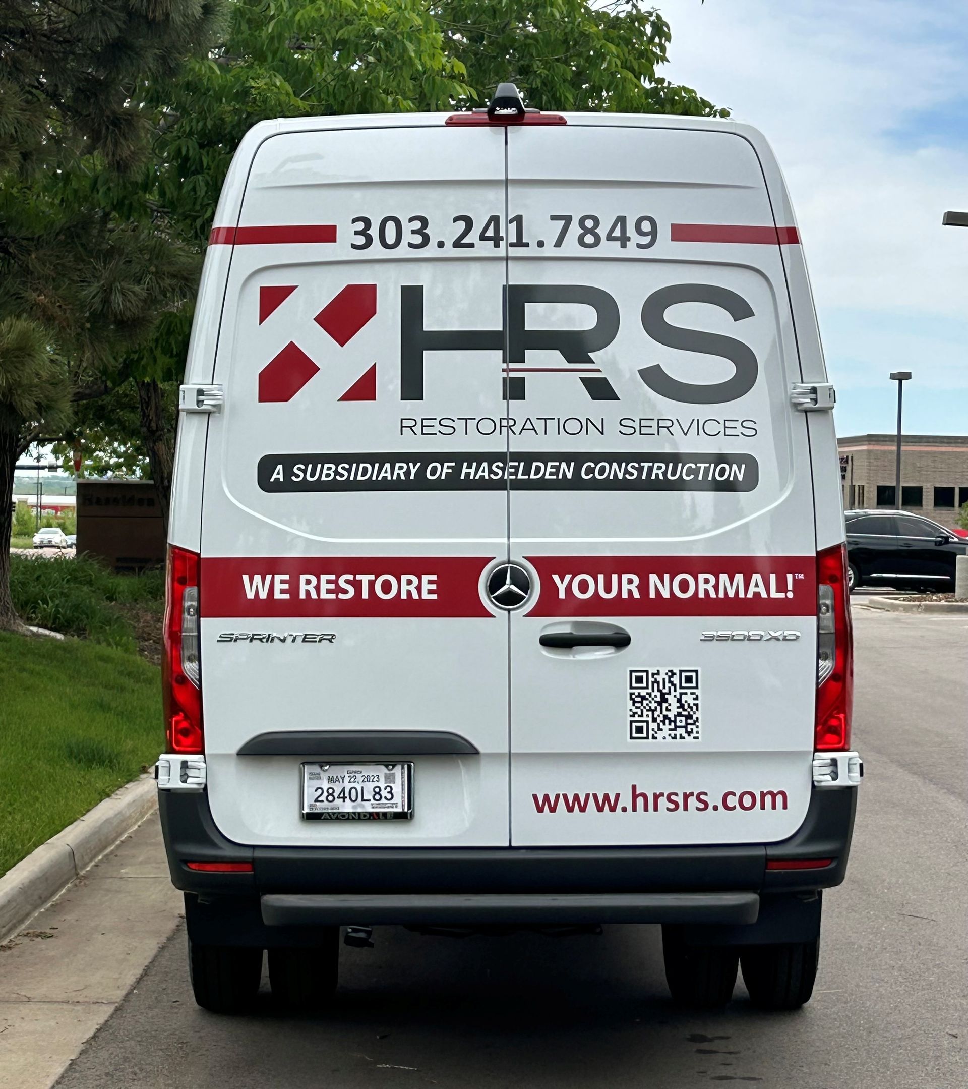 HRS Restoration Services van in Denver, CO — 24/7 emergency response for water, fire, and storm damage restoration. Call (303) 241-7849.