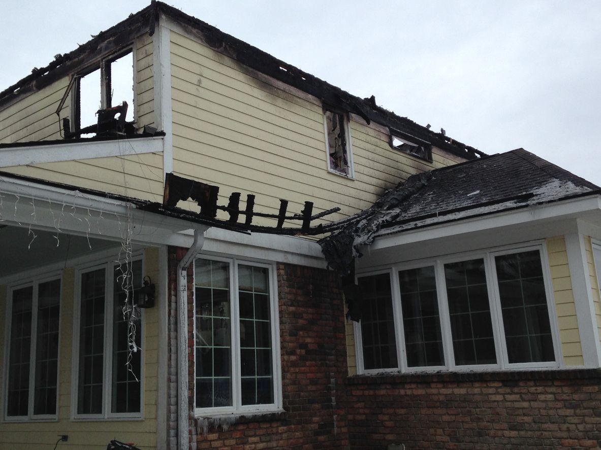 house that requires water damage restoration and fire damage restoration after a fire