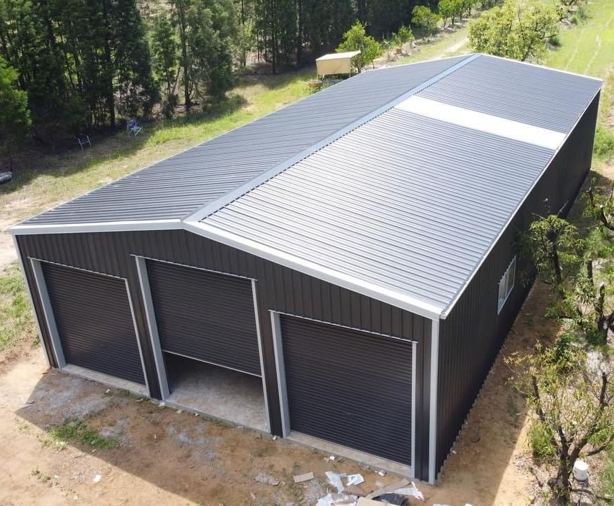 Front Roller Doors on Large Shed — ShedPro Constructions in Darawank, NSW