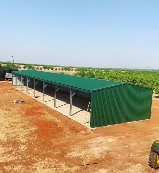 Colorbond Cottage Green Machinery Shed Kempsey — ShedPro Constructions in Darawank, NSW