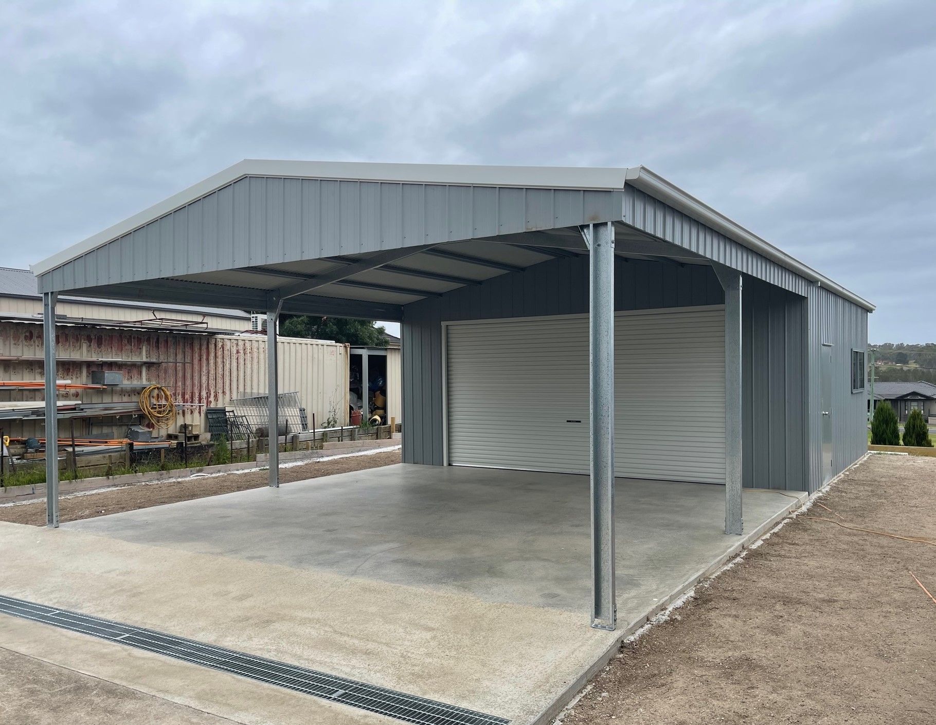 Grey Large Shed With Garaport Awning — ShedPro Constructions in Tuncurry, NSW