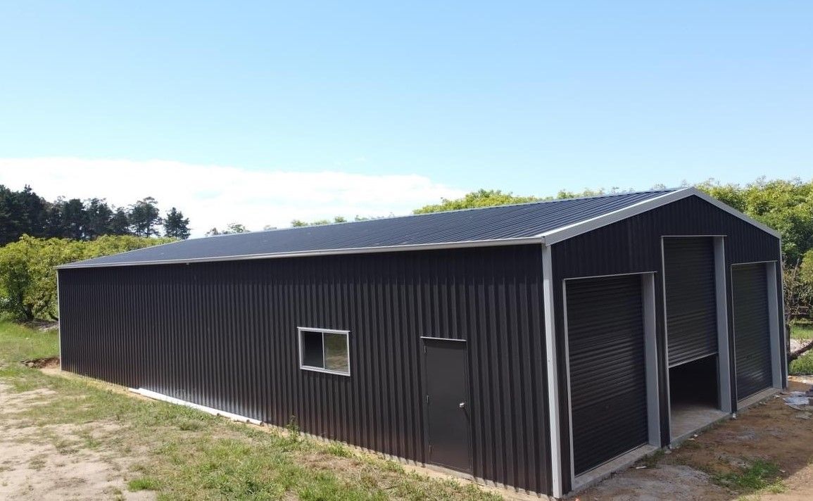 Dark Charcoal Grey Rural Farm Shed — ShedPro Constructions in Port Macquarie, NSW