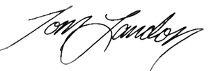 Black handwritten signature on a white background