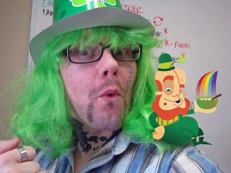 Staff member with St. Patrick's Day decorations