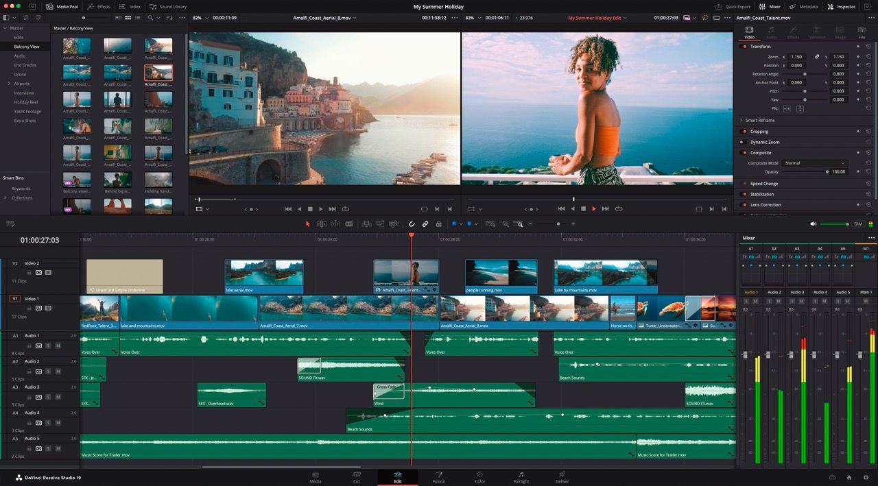 A computer screen shows a woman standing on a balcony overlooking the ocean.