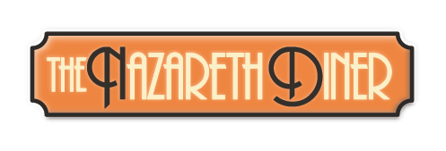 A rectangular, orange sign with dark brown, stylized Art Deco text reading 