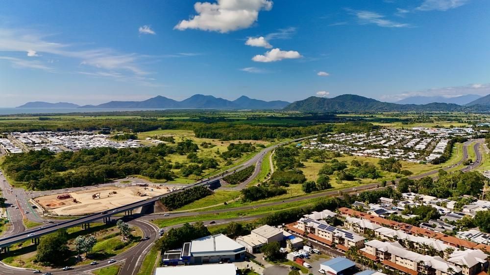 An Aerial View of a City With Mountains in the Background — Express City Couriers In Edge Hill, QLD