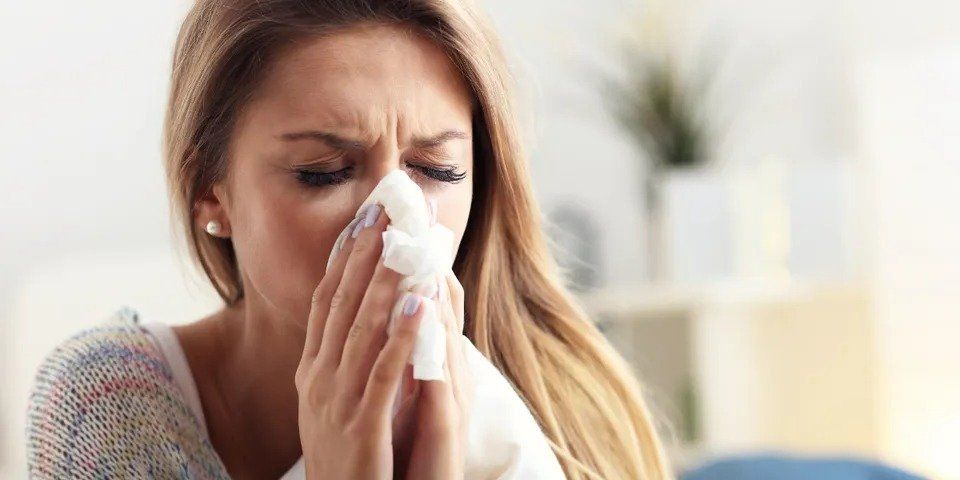 A girl sneezing — New London, WI — Griebenow Eyecare Sc Clintonville