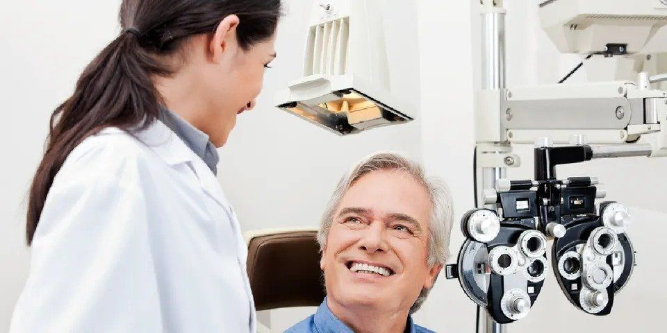 An Eye Doctor with her patient — New London, WI — Griebenow Eyecare Sc Clintonville