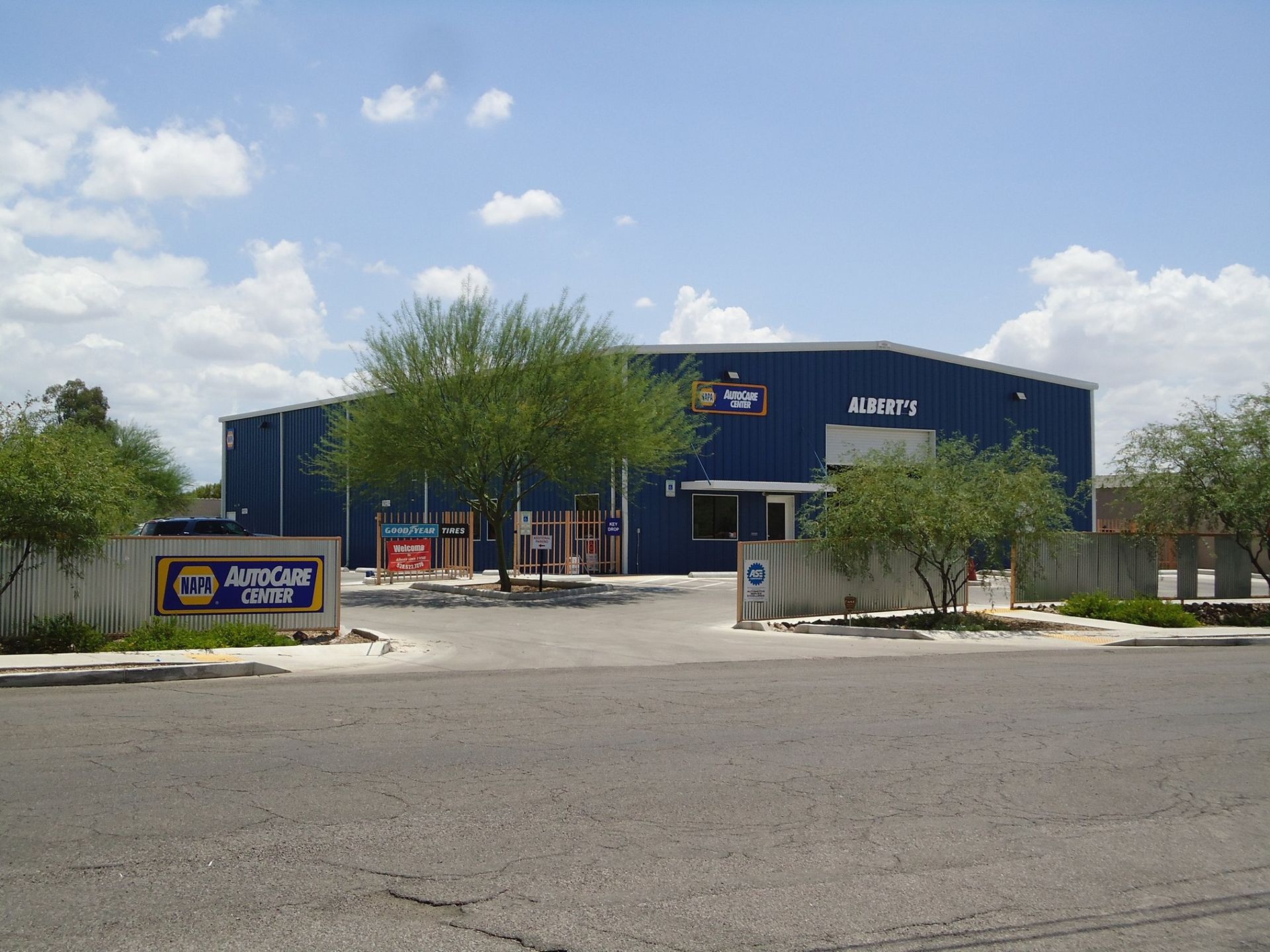 A large building with a sign that says napa auto care center