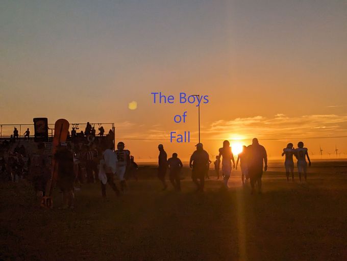 a group of people walking in a field with the words " the boys of fall " above them