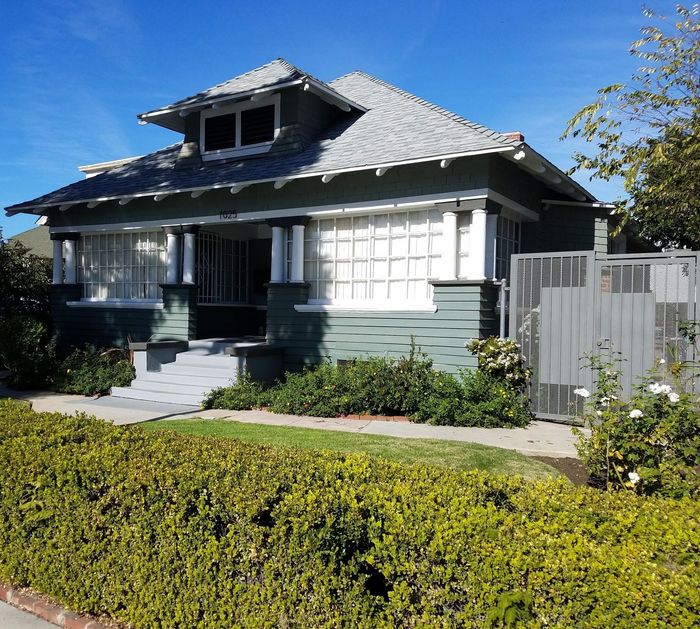 1025 W 30th Street front view of craftsman bungalow