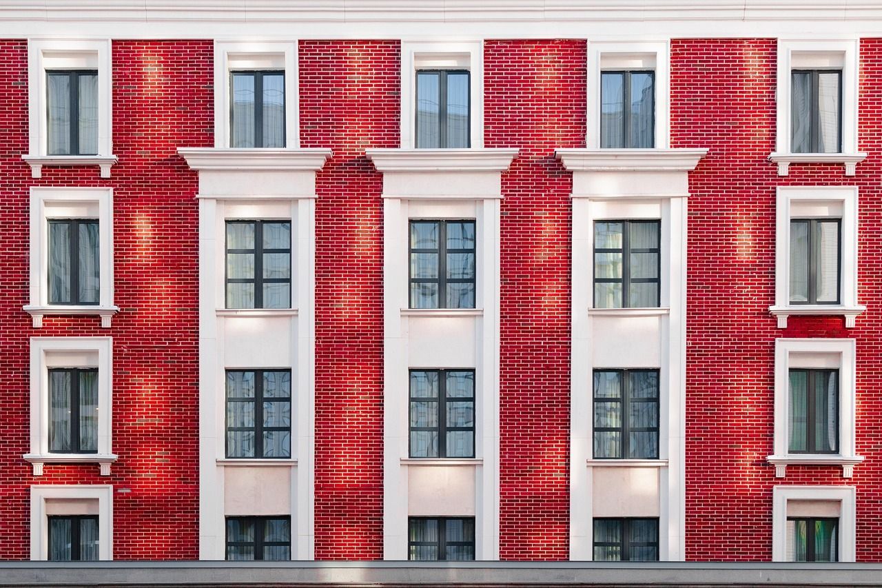 Red brick apartment building representing tenants seeking legal help for housing issues in Florida