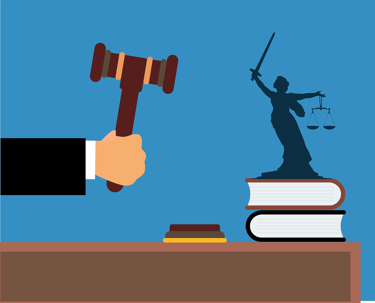 Judge's hand holding a gavel with Lady Justice on law books, symbolizing legal authority and fairness