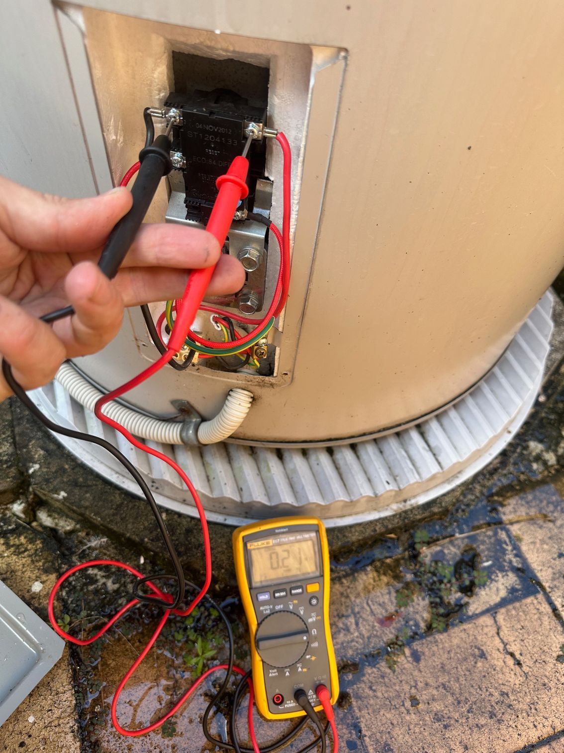 A Water Heater is ls Being Fixed — Otto’s Plumbing & Gasfitting in McDowall, QLD