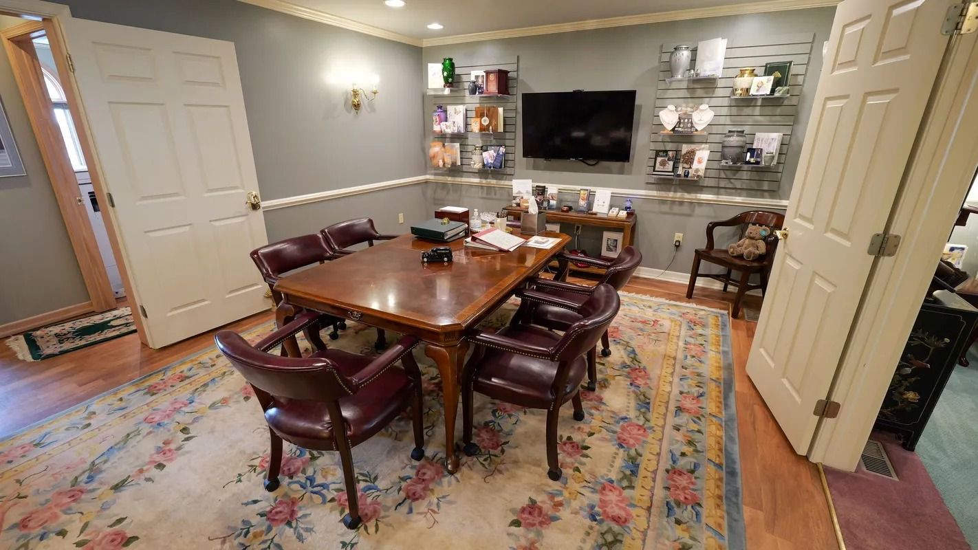 interior of jennings calvey funeral home meeting area with conference table