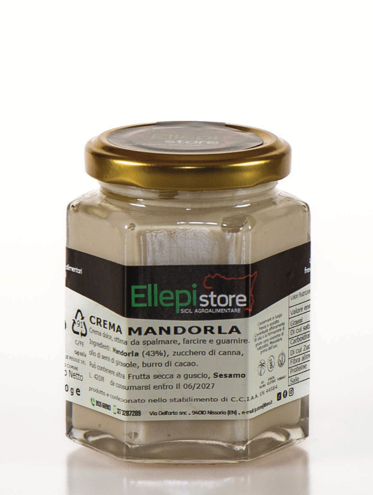 Un barattolo di crema mandorla ellepistore è appoggiato su una superficie bianca.