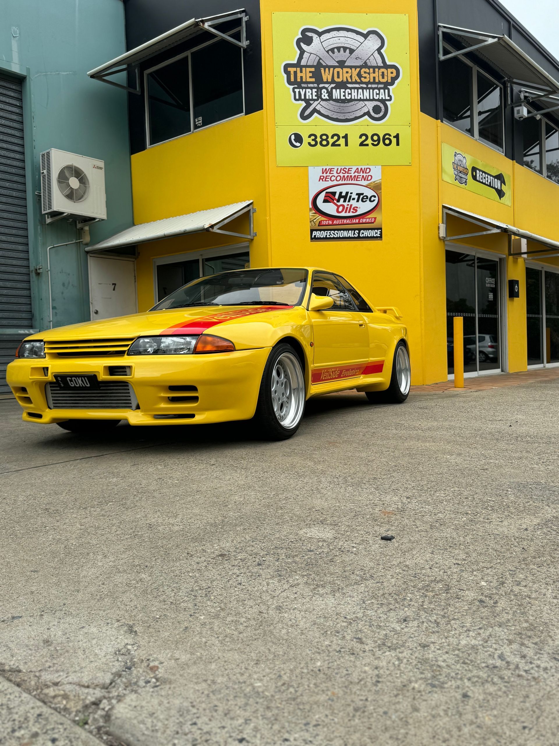 A Man Is Working on A Car Engine  — HO Performance in Cleveland, QLD