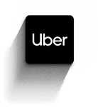Uber logo on a black square with a long diagonal shadow on a white background