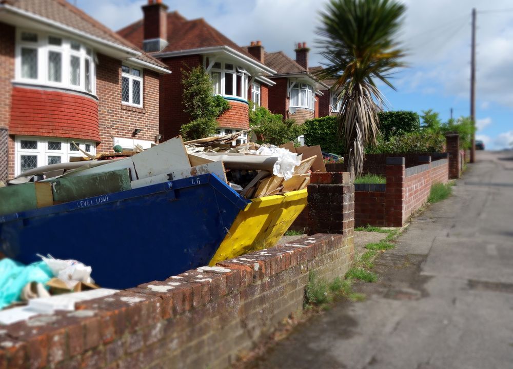 Blue and Yellow Dumpsters Overflowing — Tamworth Skips and Rubbish Removal in South Tamworth, NSW
