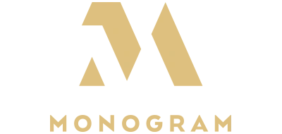 Gold geometric “MONOGRAM” logo on a white background