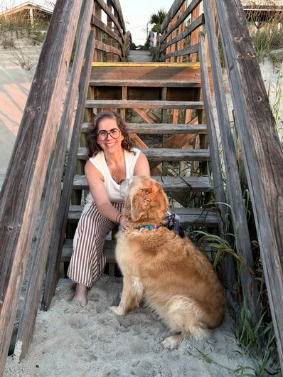 Fairfax County postpartum doula with her golden retriever