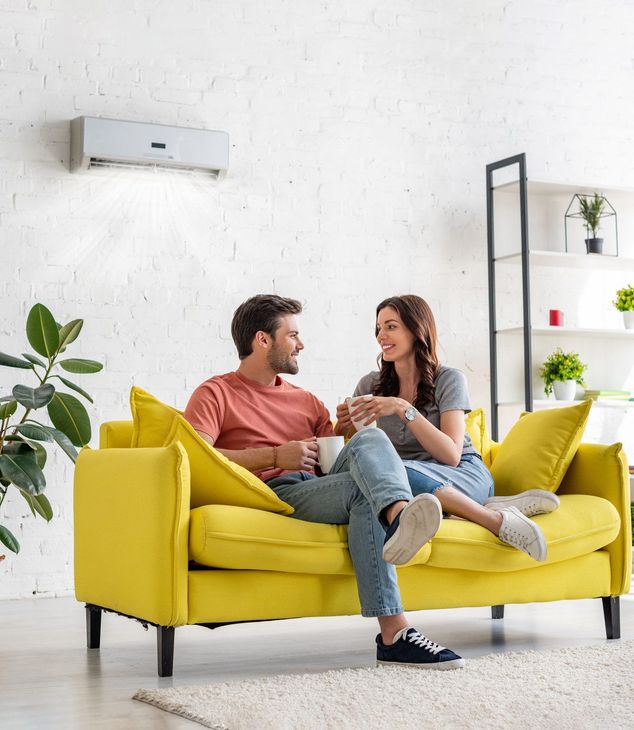 Couple Under Air Conditioner — Randleman, NC — Evans Air Services Inc. Couple Under Air Conditioner — Randleman, NC — Evans Air Services Inc.