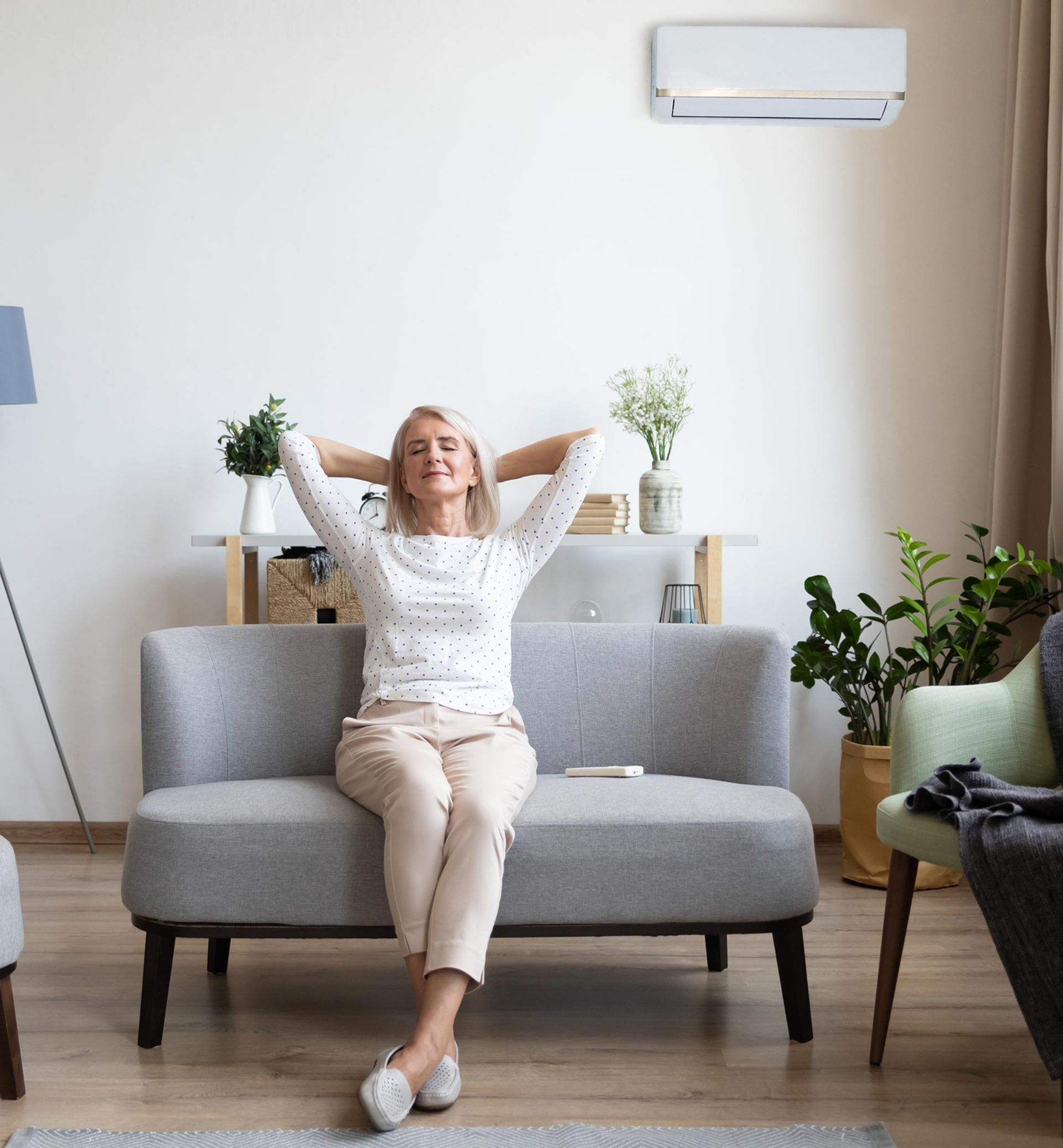 Woman Under Air Conditioner — Randleman, NC — Evans Air Services Inc. Woman Under Air Conditioner — Randleman, NC — Evans Air Services Inc.