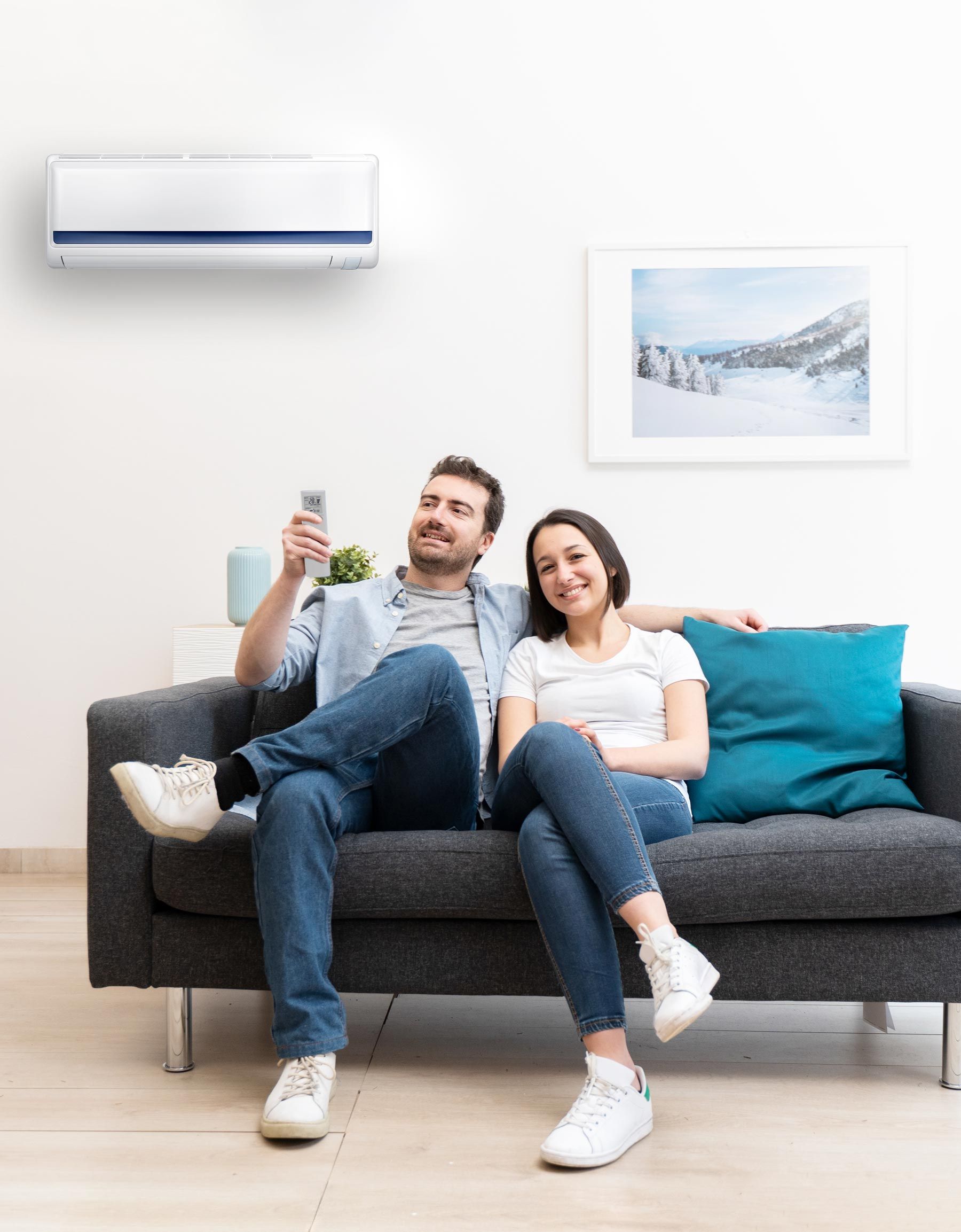 Happy Couple Under Air Conditioner — Randleman, NC — Evans Air Services Inc. Happy Couple Under Air Conditioner — Randleman, NC — Evans Air Services Inc.