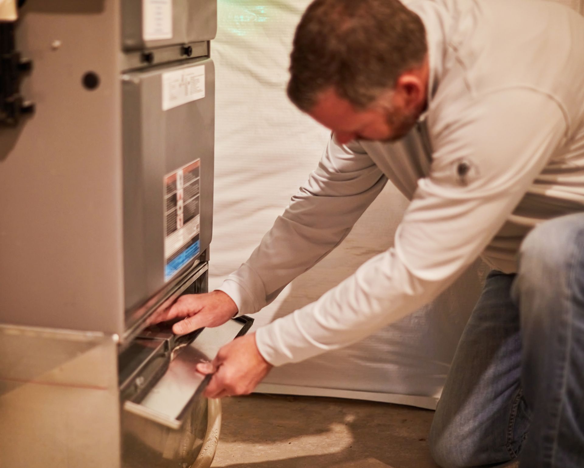 Repairing Heat Pump Unit — Randleman, NC — Evans Air Services Inc. Repairing Heat Pump Unit — Randleman, NC — Evans Air Services Inc.