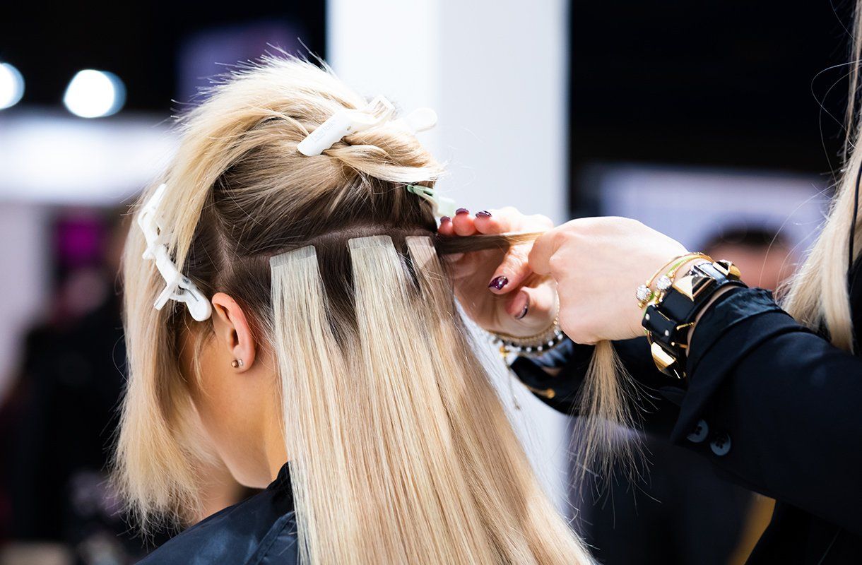Woman Having Hair Extension