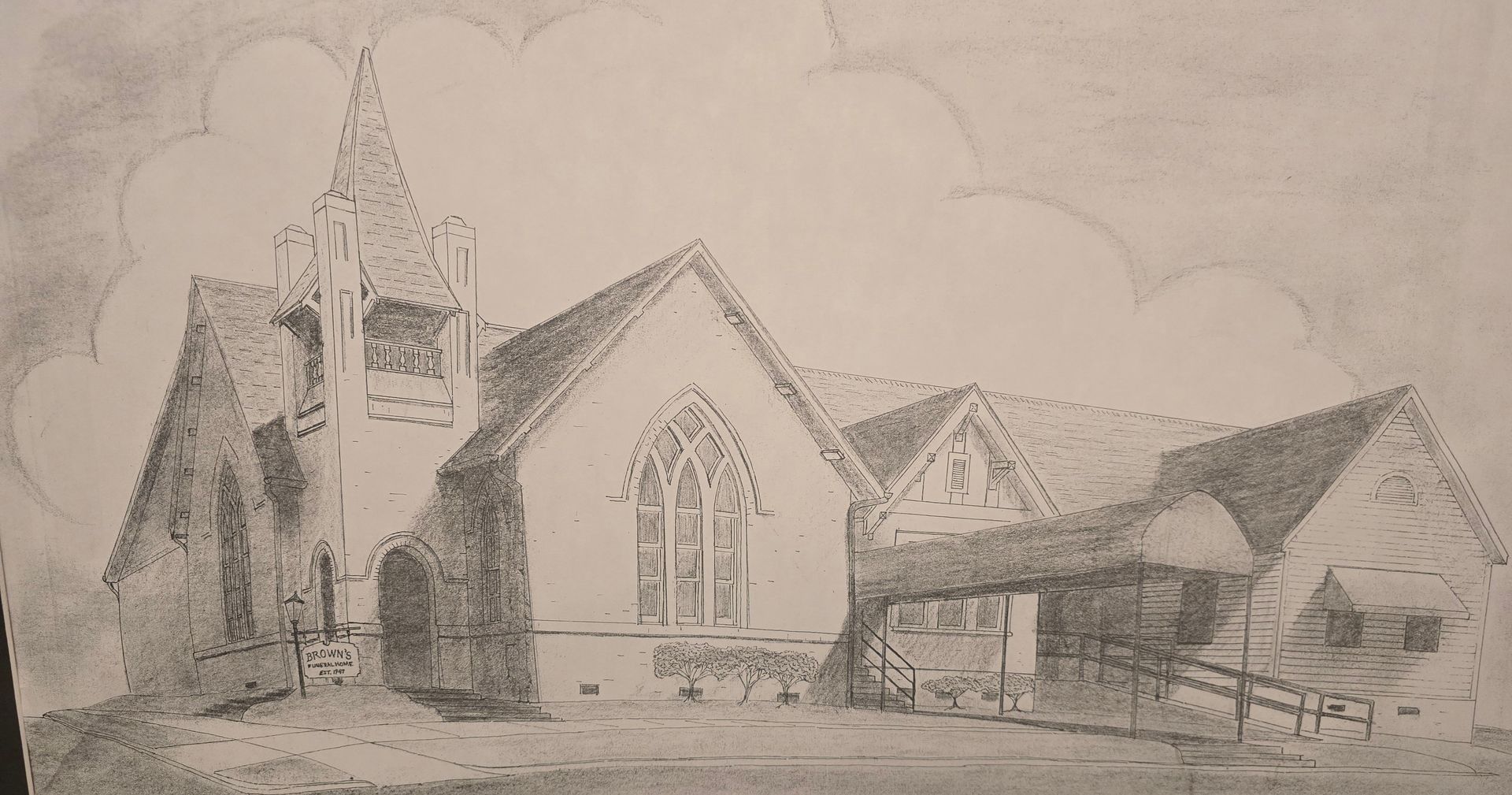 Pencil sketch of a church building with a tall steeple and surrounding roofed structures.