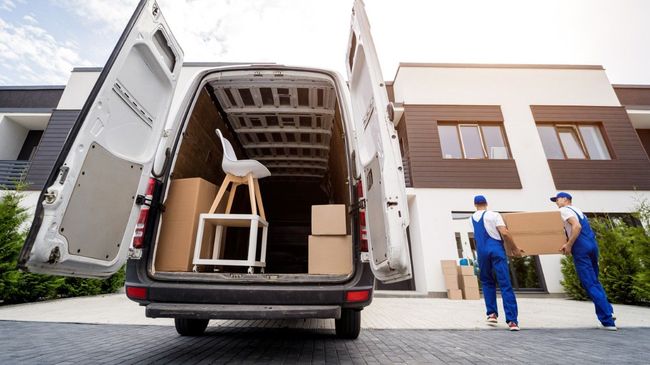 van being loaded with boxes